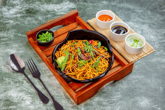 Traditional Hokkien Mee noodles stir-fried in a rich savory sauce, inspired by Chinese and Southeast Asian cuisine. A popular street food and restaurant dish known for its bold flavor and satisfying t