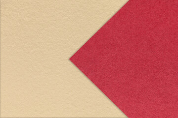 Fototapeta premium Textured light beige paper background, half two colors with red arrow, macro. Template with copy space for banner