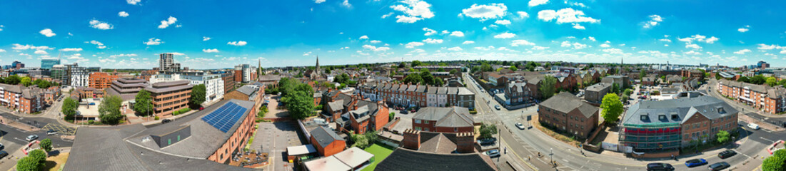 Obraz premium High Angle Ultra Wide Panoramic View of Iconic Buildings at Central Reading London City and Town Centre. Aerial Drone Tour of England United Kingdom. July 11th, 2025