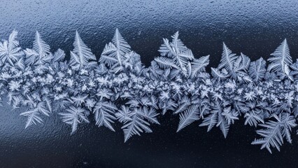 Frosty ice crystals on dark background, winter wonderland scene