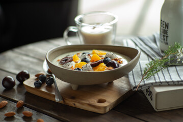 Mixed fruits and berry in the fresh milk for breakfast time © Phichat