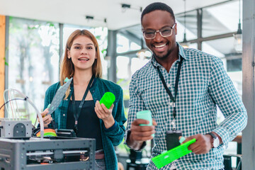 Two Product Designers Testing 3D Printed Prototypes