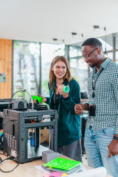 Two Product Designers Testing 3D Printed Prototypes