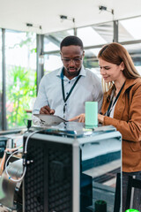 Two Product Designers Testing 3D Printed Prototypes