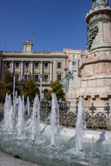 A decorative fountain with sculptures in the city of Zaragoza