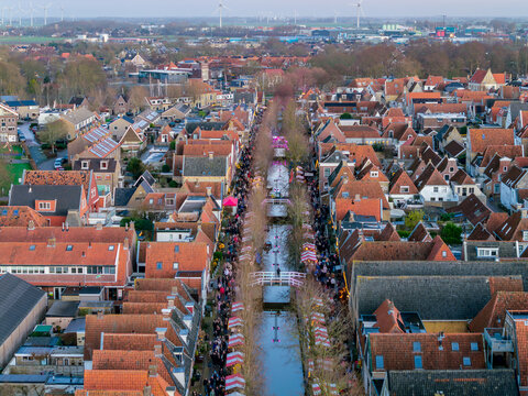Aerial drone view of Harlingen Christmas market at sunset