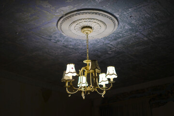 antique chandelier on the ceiling