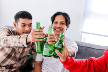 Friends Enjoying Beers Together in Cozy Living Room Setting