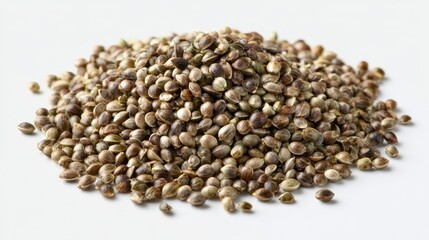 Natural hemp seeds in a clean studio setup with soft lighting