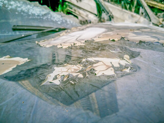 Burnt new car. burnt metal texture, metallic background.