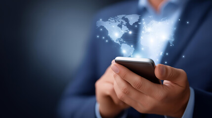 Faceless connected world economy, businessman holds smartphone with digital link symbolizing global business connection, big data analytics and intelligence drive evolution, defocu