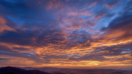 wholeness. Golden sunrise over a calm horizon, first light on clouds, serene landscape with deep blue sky. travel magazines, destination branding, designed for outdoor magazines and nature guides.