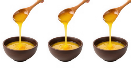 Three wooden spoons pouring golden ghee or honey into small brown bowls isolated on transparent background