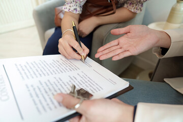 Obraz premium Real Estate Agreement. Signing contract for property purchase.