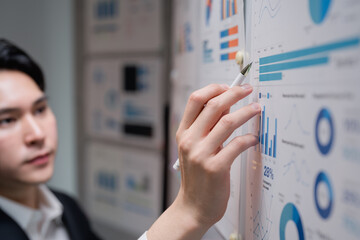 Businessman analyzing data charts for business strategy planning