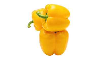 Isolated fresh yellow bell peppers stacked together, healthy eating and natural food sources
