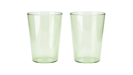 Isolated pair of green glass cups ready for drinks on table, transparent, no background