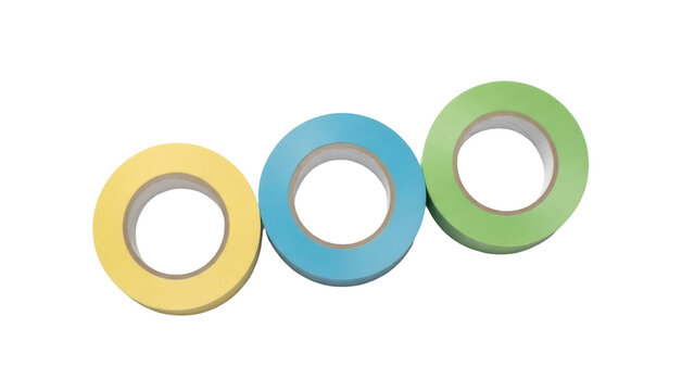 Isolated rolls of colorful masking tape forming a line for arts and crafts projects at home