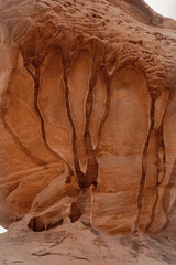 Close up of Desert Rock Formations, in Saudi Arabia , Dramatic Red Sandstone Landscape with antient water erosionated marks 
