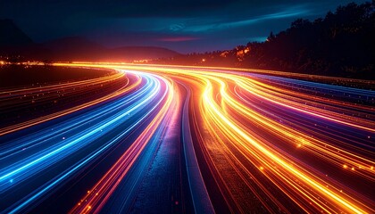 Colorful light trails curve through night highway, capturing motion, speed, and time in vivid streaks.