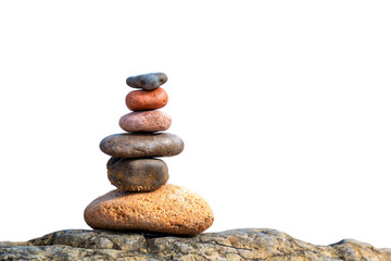 Pile of pebbles on a beach isolated on white or transparent background, balanced stones png cut out