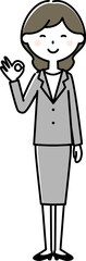 OKサインを出すスーツの女性