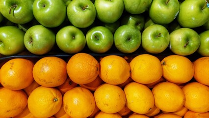 Fresh Green Apples and Bright Oranges
