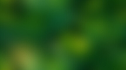 Abstract blurred background of lush green foliage with dappled sunlight filtering through.