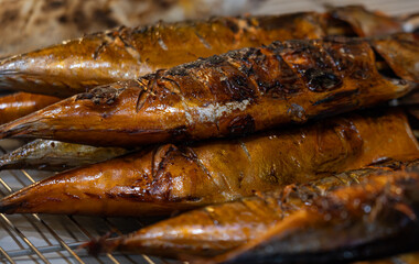 A rack of fish is on a table