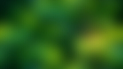 Abstract background of blurred green and yellow foliage with dappled sunlight.