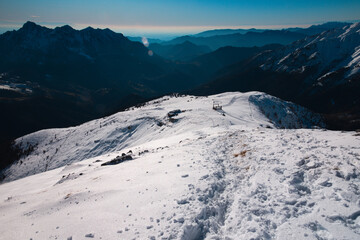 Tracks in the snow along the pathway to the top of the Alpine peak Pizzo Arera (2,512 metres -...