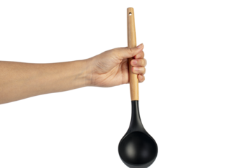 Black plastic spatula in hand on transparent background
