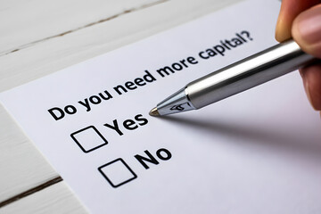 "Do you need more capital?" Question on White Paper with Check Boxes Business Concept