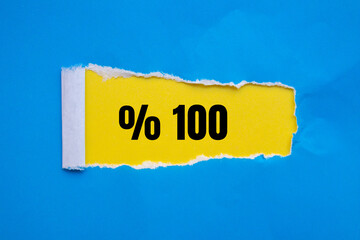 One hundred percent message written on ripped torn paper background. Conceptual One hundred percent symbol. Copy space.