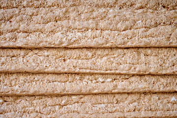 Crispy whole grain bread, top view. Healthy eating.