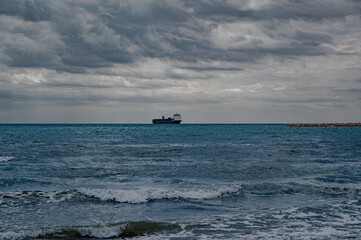 Large container ship approaching the port of Durres, Albania, highlighting maritime transport, logistics, and international trade infrastructure.