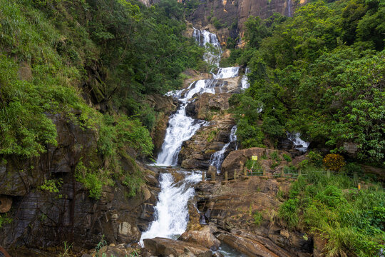 Ravana Ella Waterfall Cascading Through Lush Green Forest, Sri Lanka