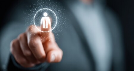 A person is pointing at a person icon on a screen