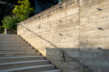 Urban stairs built in concrete architecture with modern exterior structure, strong geometry, clean design detail and architectural precision