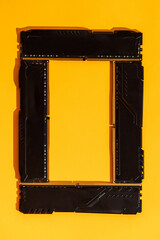 Frame made of RAM modules on bright yellow background. High quality photo