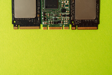 M.2 SSD drives bottom edge aligned on green background with copy space. High quality photo