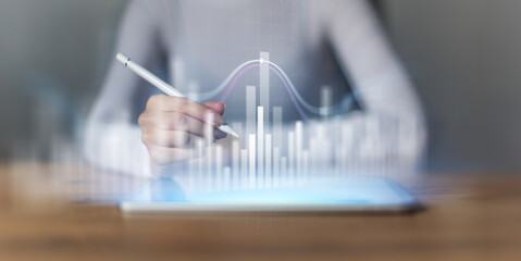 Interactive Data Visualization and Business Analytics Interface Projected on Virtual Screen.