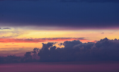 Dramatic late afternoon sunset sky glowing with magical, calming colors