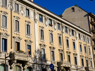 Fototapeta premium Old residential buildings along corso Sempione in Milan, Italy