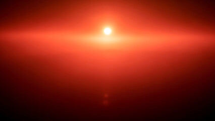Obraz premium Bright Sun Over Red Sky With Haze and Lens Flare