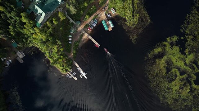 Aerial view of picturesque lake and dock at Seigneurie du Triton, Quebec