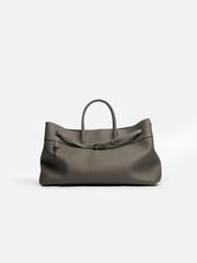 Naklejka premium Woman leather bag on a white background