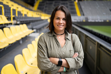 Close up bust portrait of woman at football arena, fandom and leisure concept