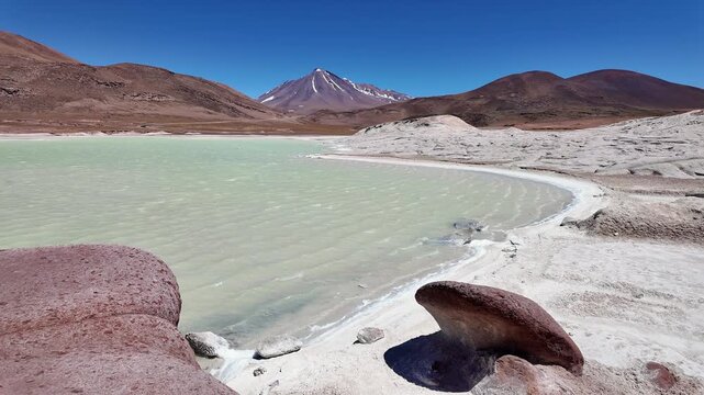 San Pedro de Atacama, Chile: Panorama of Mi&ntilde;iques volcano, aguas caliente and salar del Carmen from Piedras Rojas view point near San Pedro de Atacama, Chile