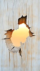 Sunset Through Hole in Weathered Wood Panel